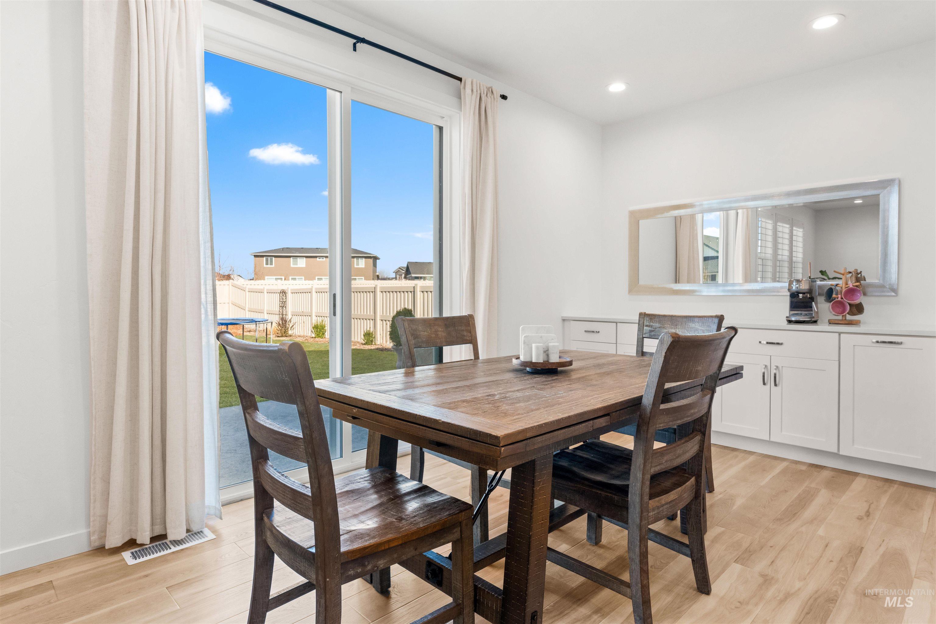 2040 West Gelding Street Middleton, ID 83644 - Photo 11 of 22 Dining area featuring light wood-style floors and recessed lighting