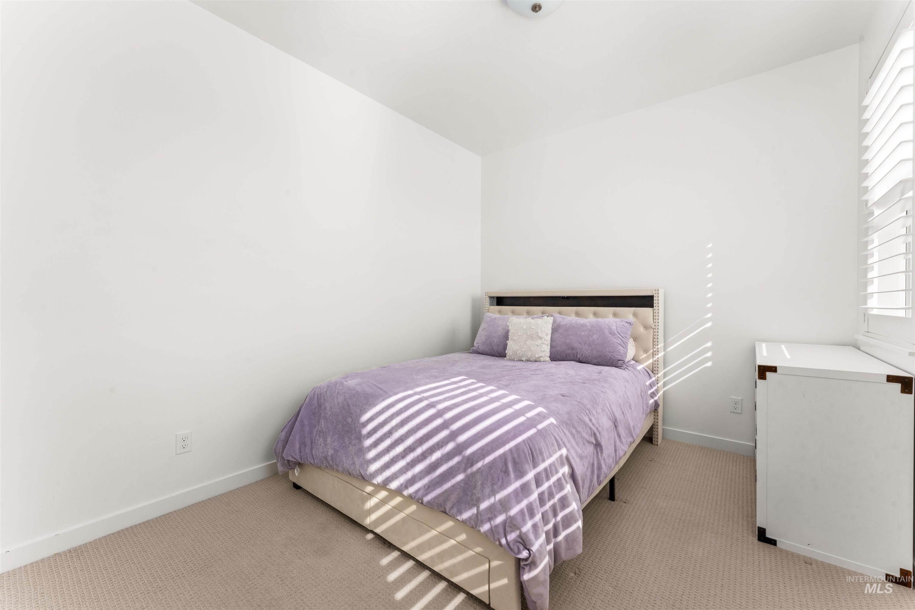 2040 West Gelding Street Middleton, ID 83644 - Photo 14 of 22 Carpeted bedroom featuring baseboards