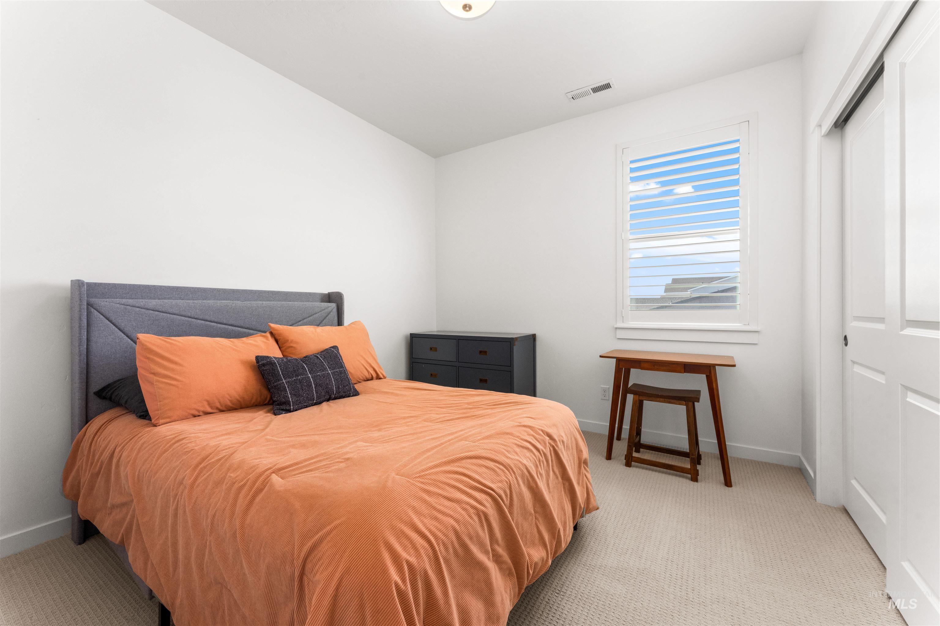 2040 West Gelding Street Middleton, ID 83644 - Photo 15 of 22 Bedroom featuring light carpet and a closet
