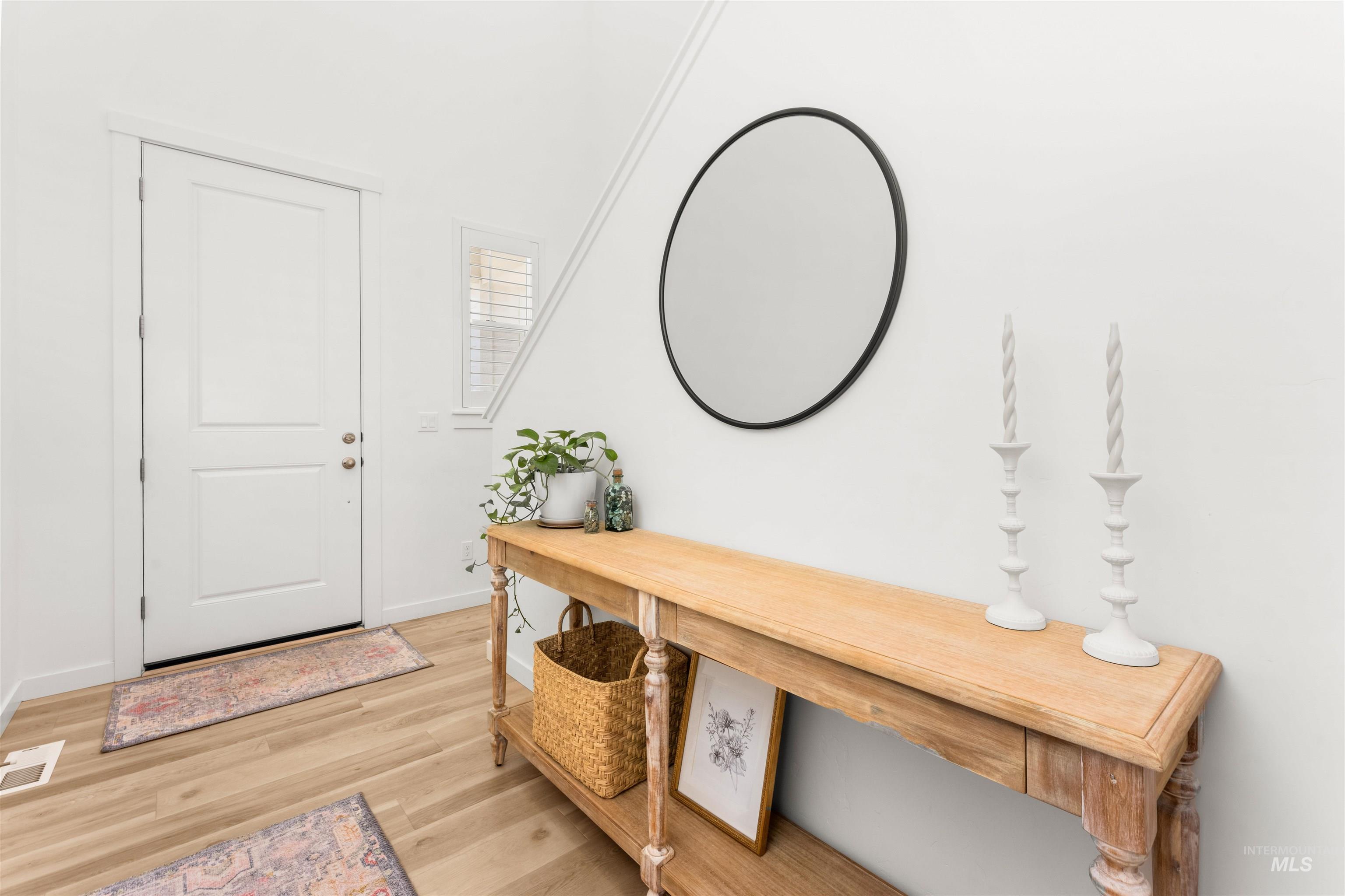 2040 West Gelding Street Middleton, ID 83644 - Photo 7 of 22 Foyer featuring light wood-type flooring and baseboards