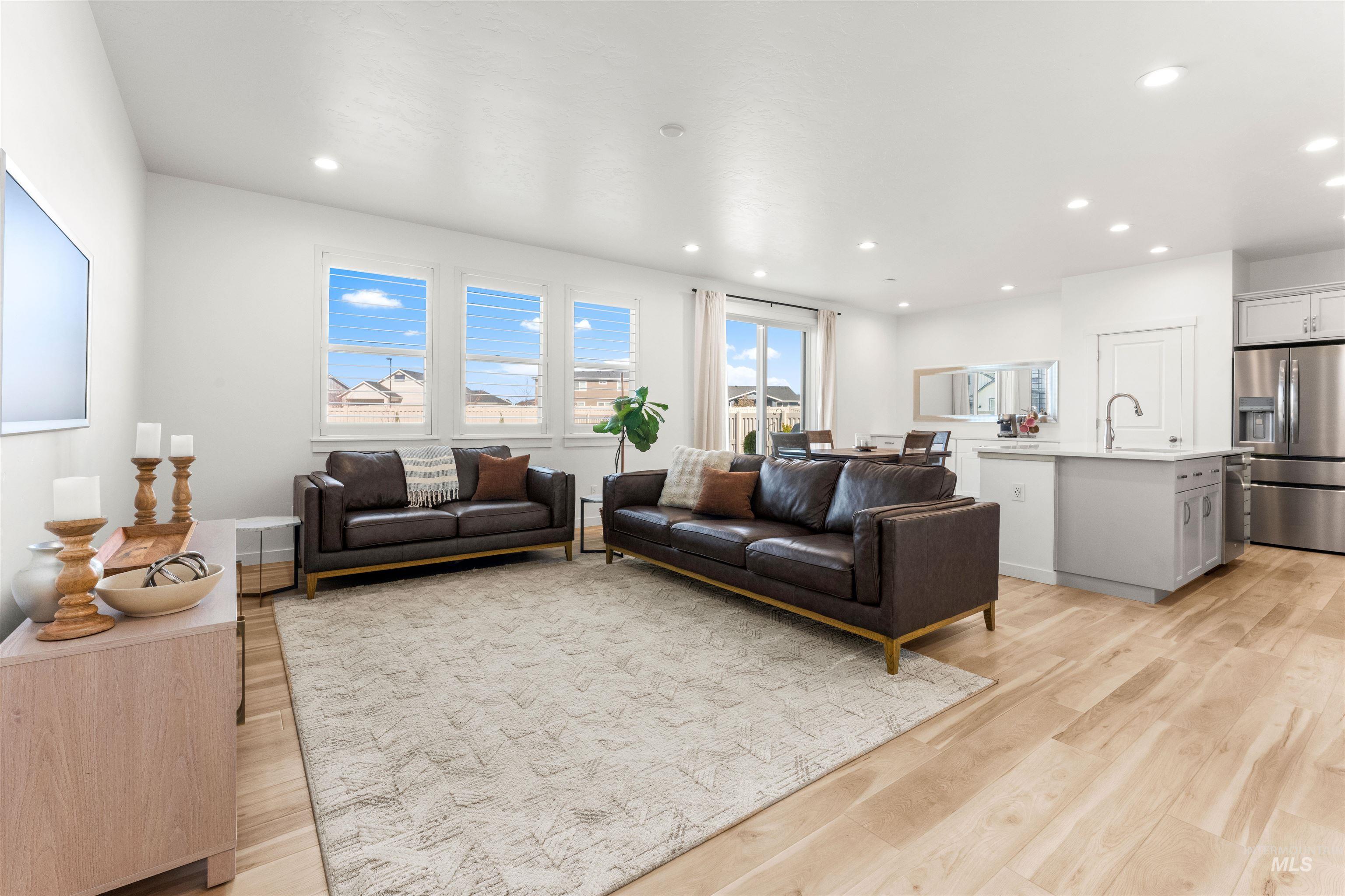 2040 West Gelding Street Middleton, ID 83644 - Photo 10 of 22 Living room with light wood finished floors and recessed lighting