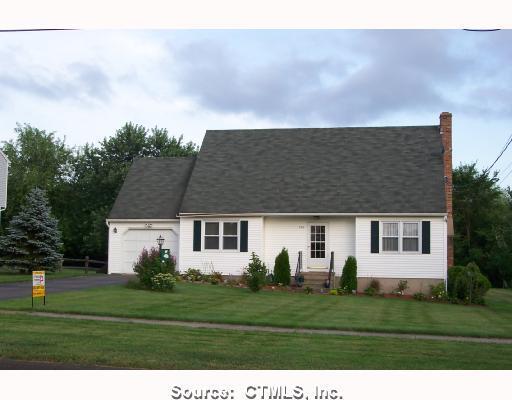 740 North Farms Road Wallingford, CT 06492 - Photo 1 of 1 a front view of a house with a yard