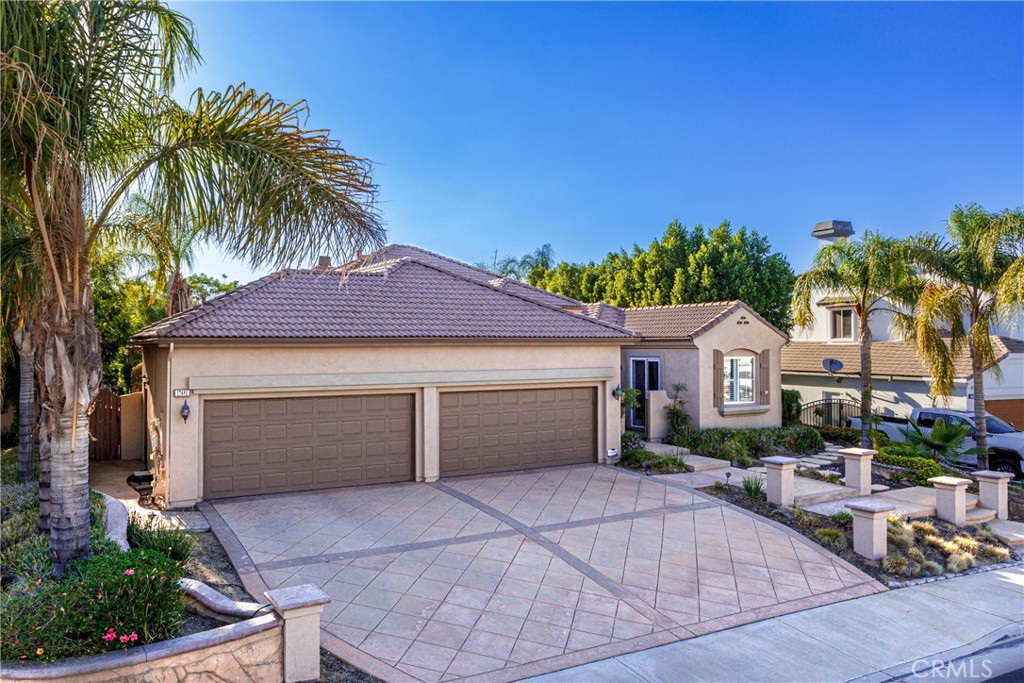 17461 Half Moon Court Riverside, CA 92503 - Photo 1 of 1 a front view of a house with garden