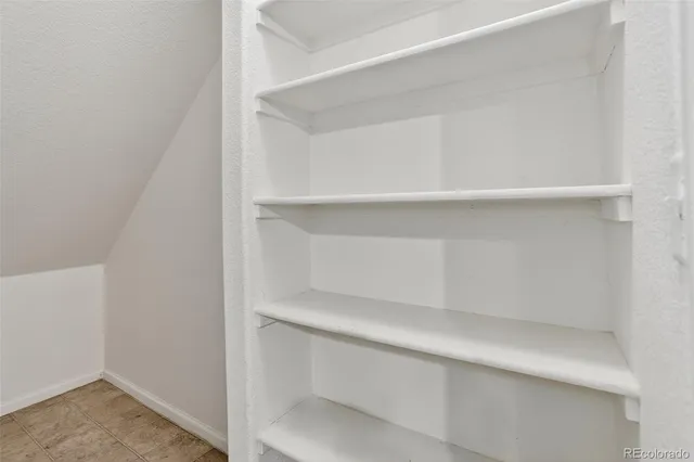 a view of an empty walk in closet