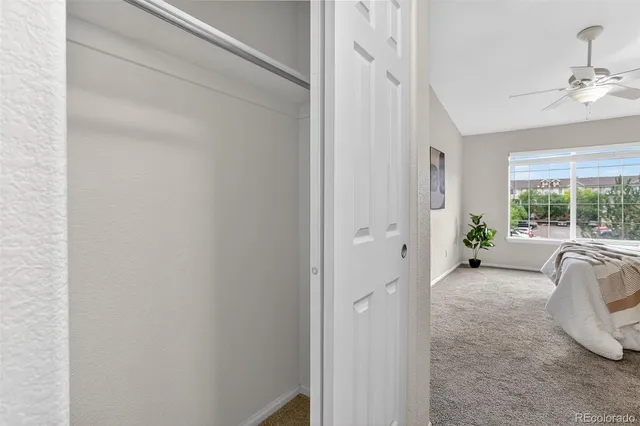 a view of a livingroom with furniture and windows
