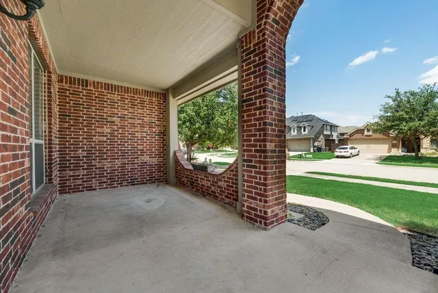 a view of a yard with porch