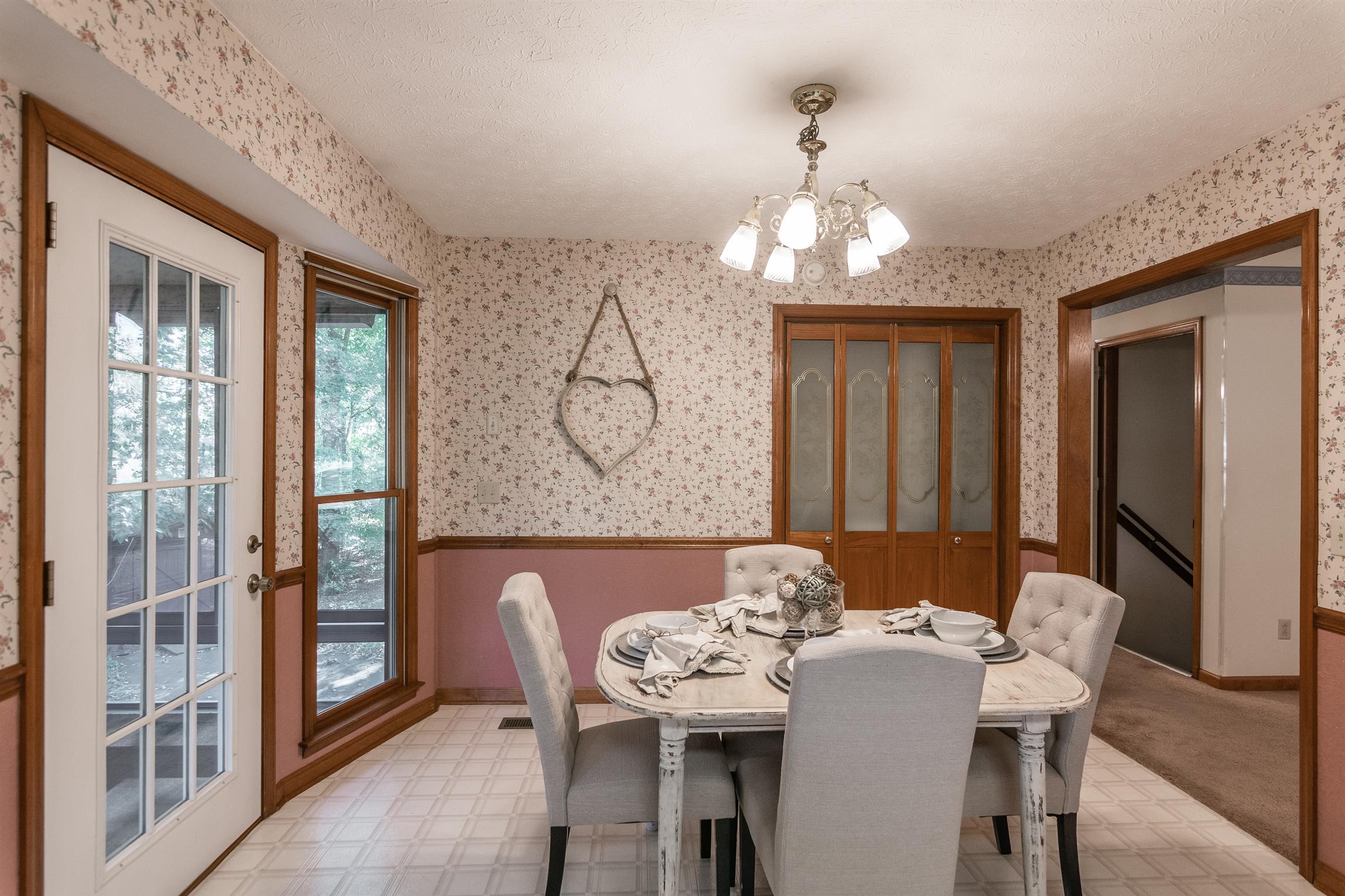 202 Bell Lane Springfield, TN 37172 - Photo 11 of 23 a view of a dining room with furniture window and wooden floor