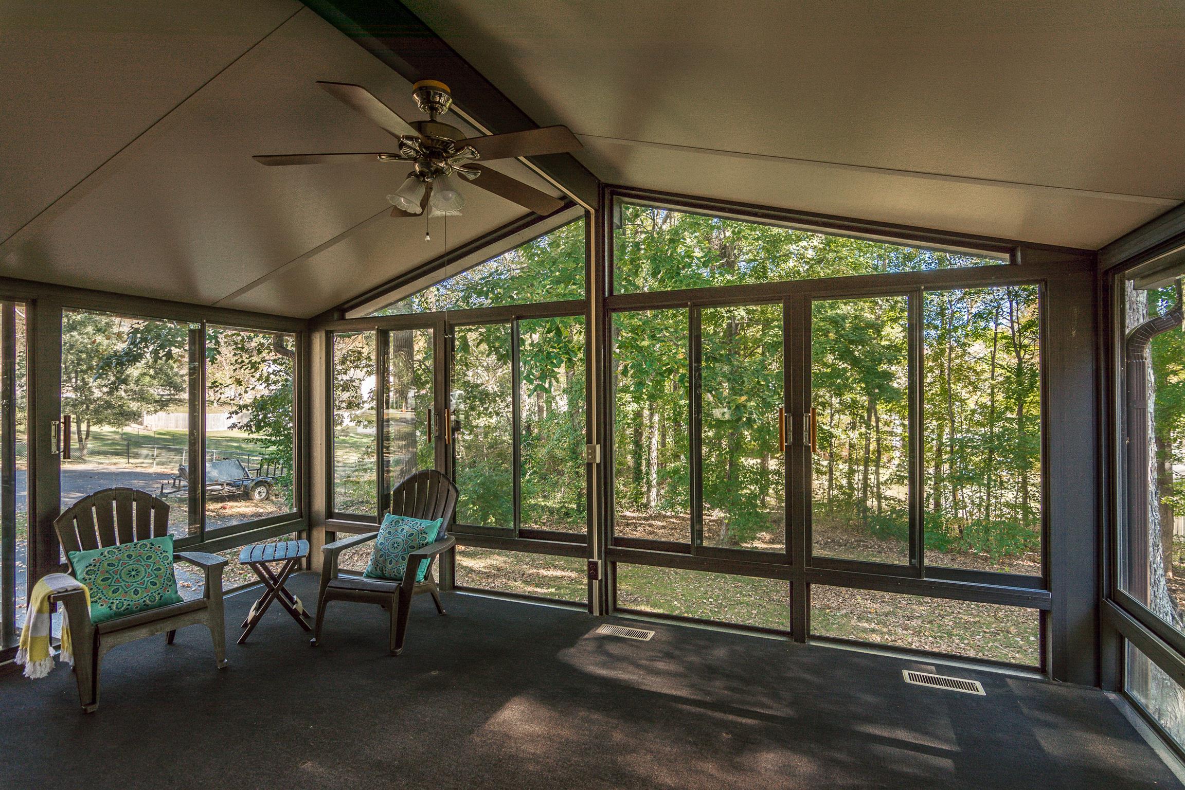 202 Bell Lane Springfield, TN 37172 - Photo 12 of 23 a view of a room with furniture and floor to ceiling windows