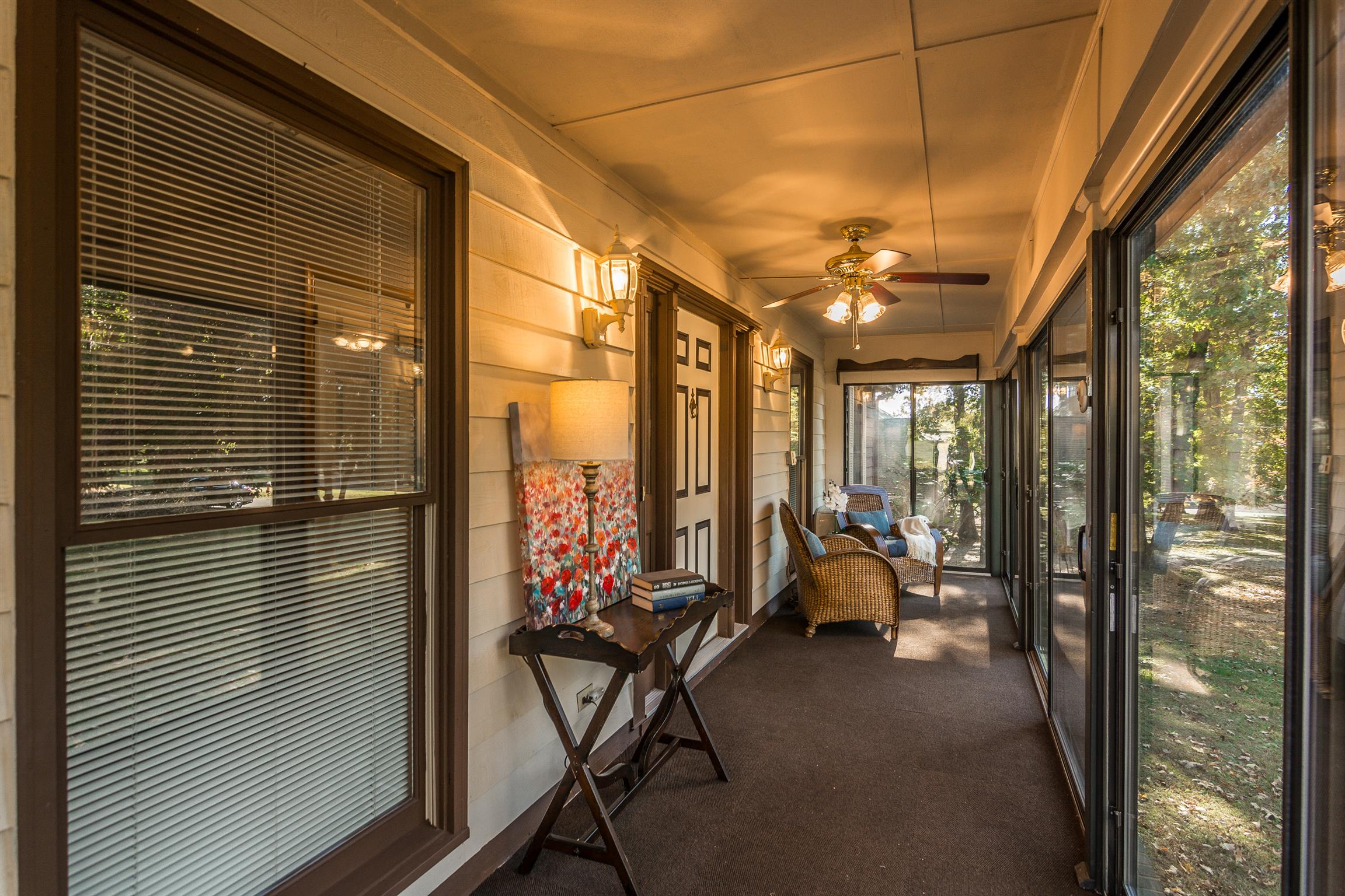202 Bell Lane Springfield, TN 37172 - Photo 3 of 23 a balcony with hardwood table and chairs