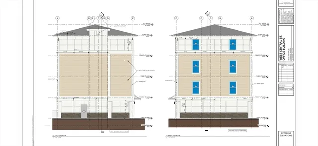 a view of a living room with windows