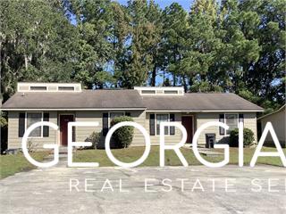 an outdoor view of house with outdoor seating