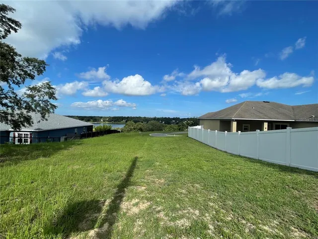 a view of a lake in middle of the house