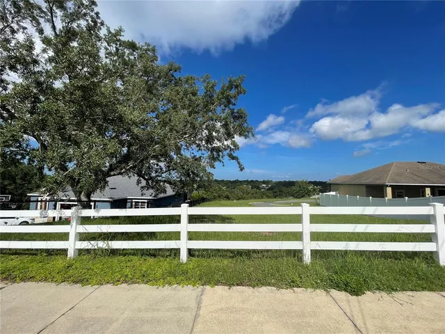 a view of a garden with an outdoor space