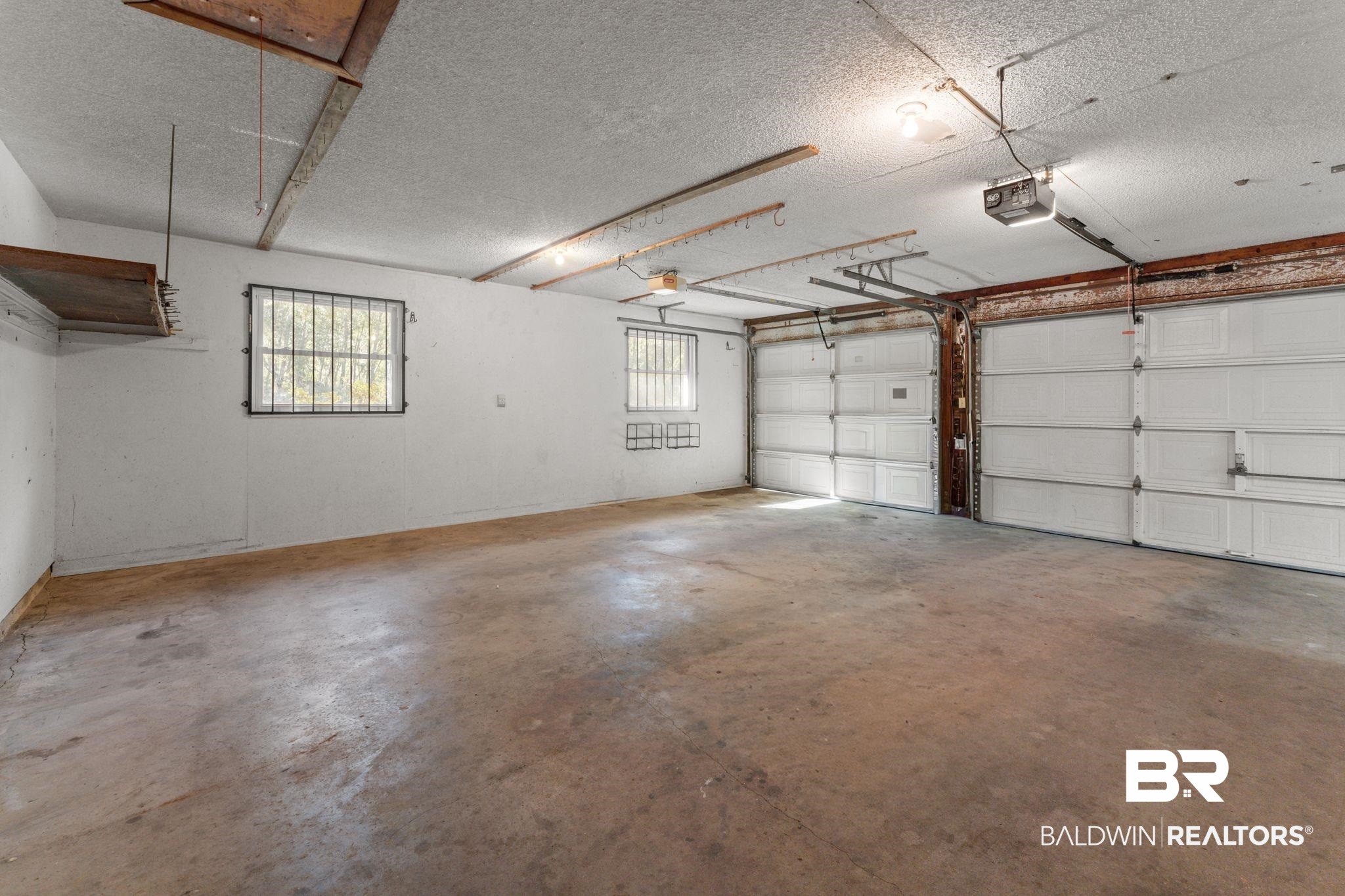 32989 Antietam Road Lillian, AL 36549 - Photo 27 of 56 Garage with a garage door opener