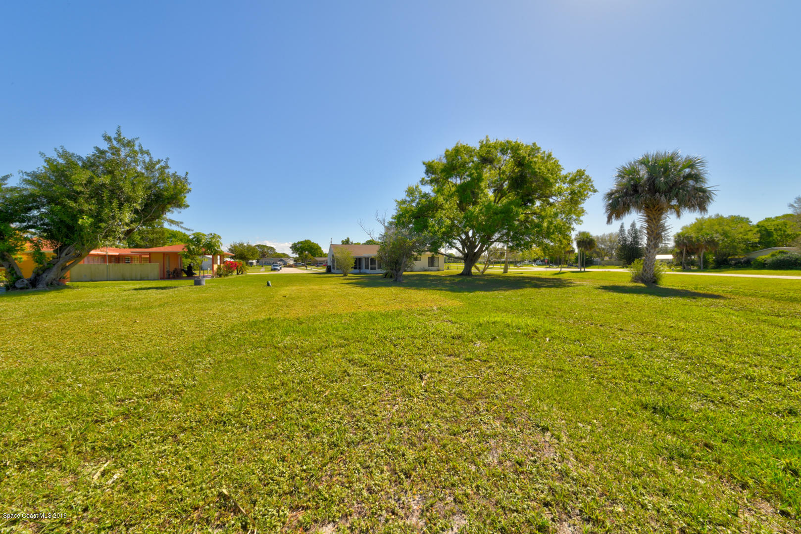 1300 Cromey Road Northeast Palm Bay, FL 32905 - Photo 27 of 29 a view of yard and ocean view