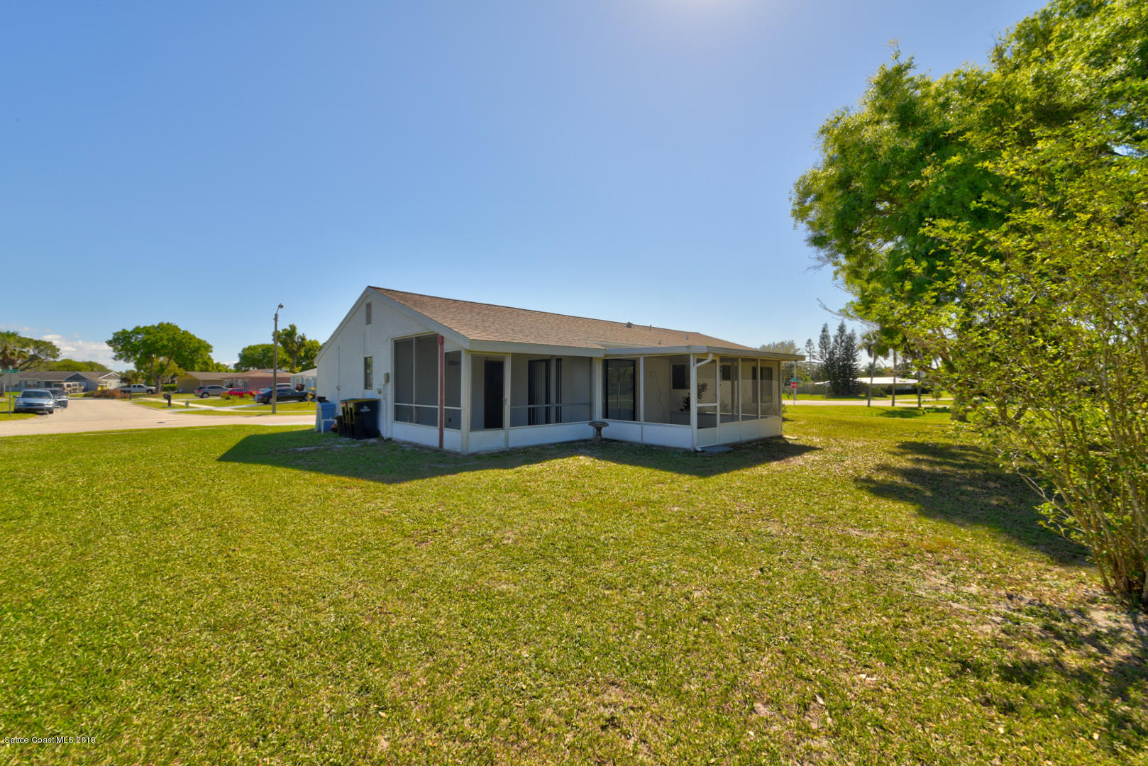 1300 Cromey Road Northeast Palm Bay, FL 32905 - Photo 29 of 29 a house with swimming pool in front of it