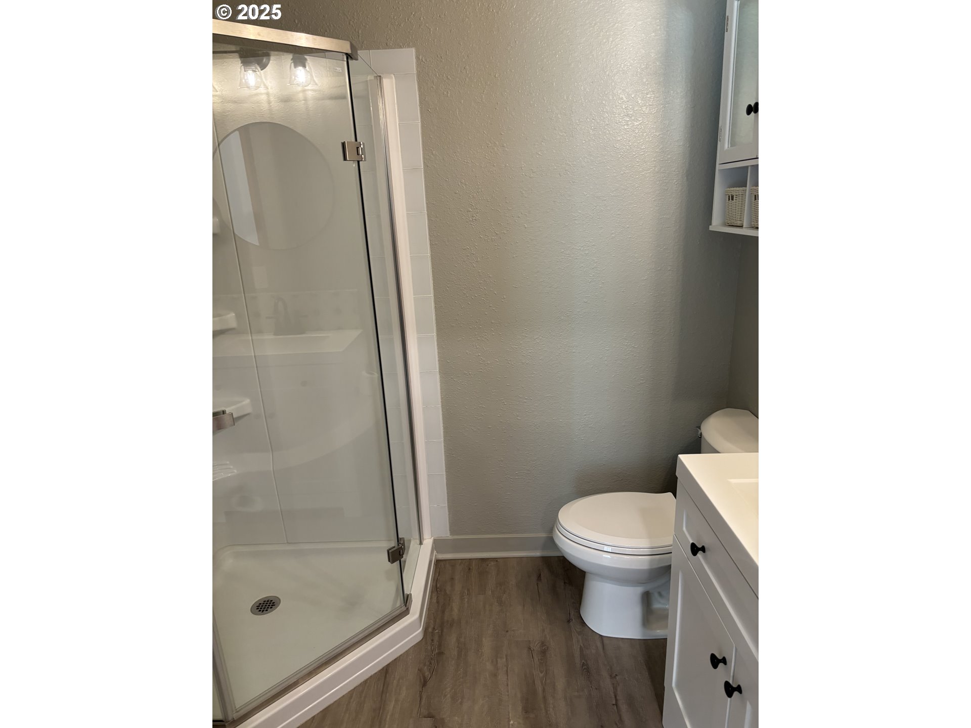 704 Patrol Street Molalla, OR 97038 - Photo 11 of 29 a bathroom with a toilet and a shower