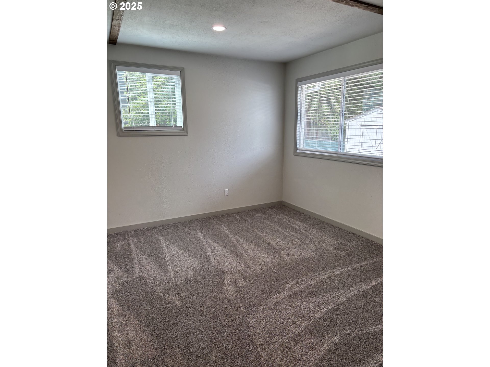 704 Patrol Street Molalla, OR 97038 - Photo 15 of 29 a view of empty room with windows