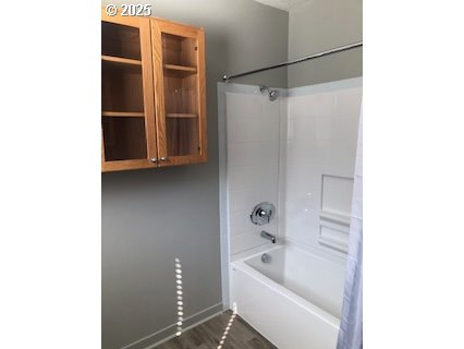 704 Patrol Street Molalla, OR 97038 - Photo 27 of 29 a bathroom with a tub shower vanity and a sink