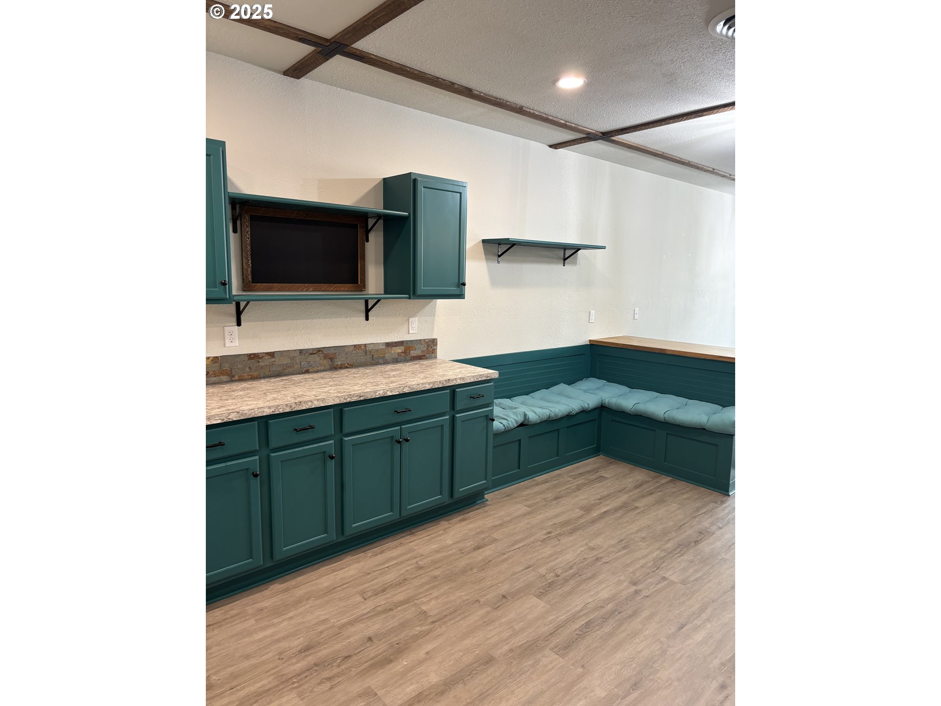 704 Patrol Street Molalla, OR 97038 - Photo 5 of 29 a kitchen with a sink and a microwave