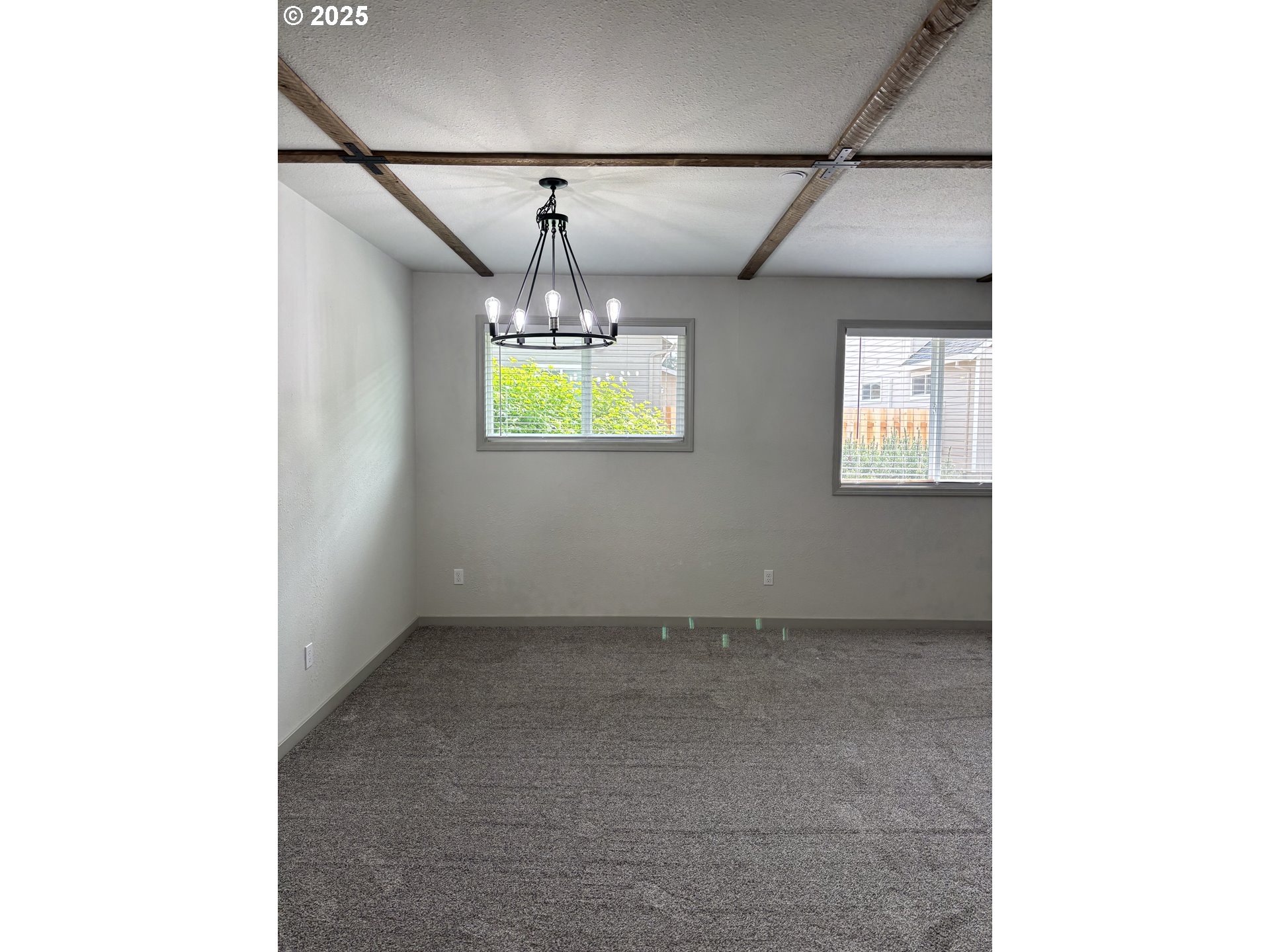 704 Patrol Street Molalla, OR 97038 - Photo 7 of 29 a view of an empty room with a window