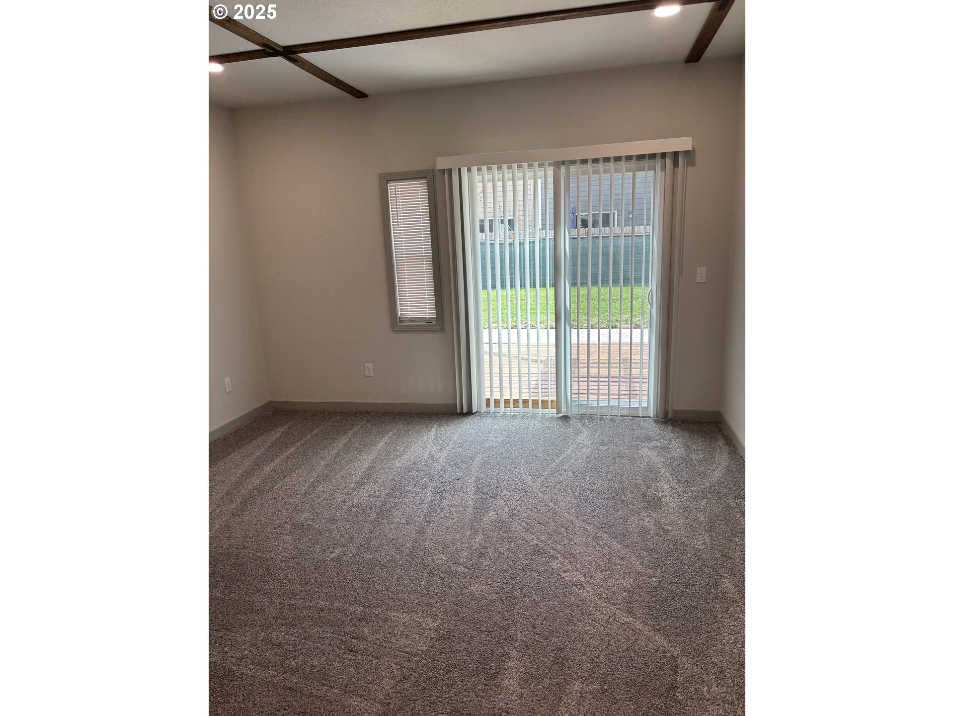 704 Patrol Street Molalla, OR 97038 - Photo 10 of 29 a view of a room with a wooden floor
