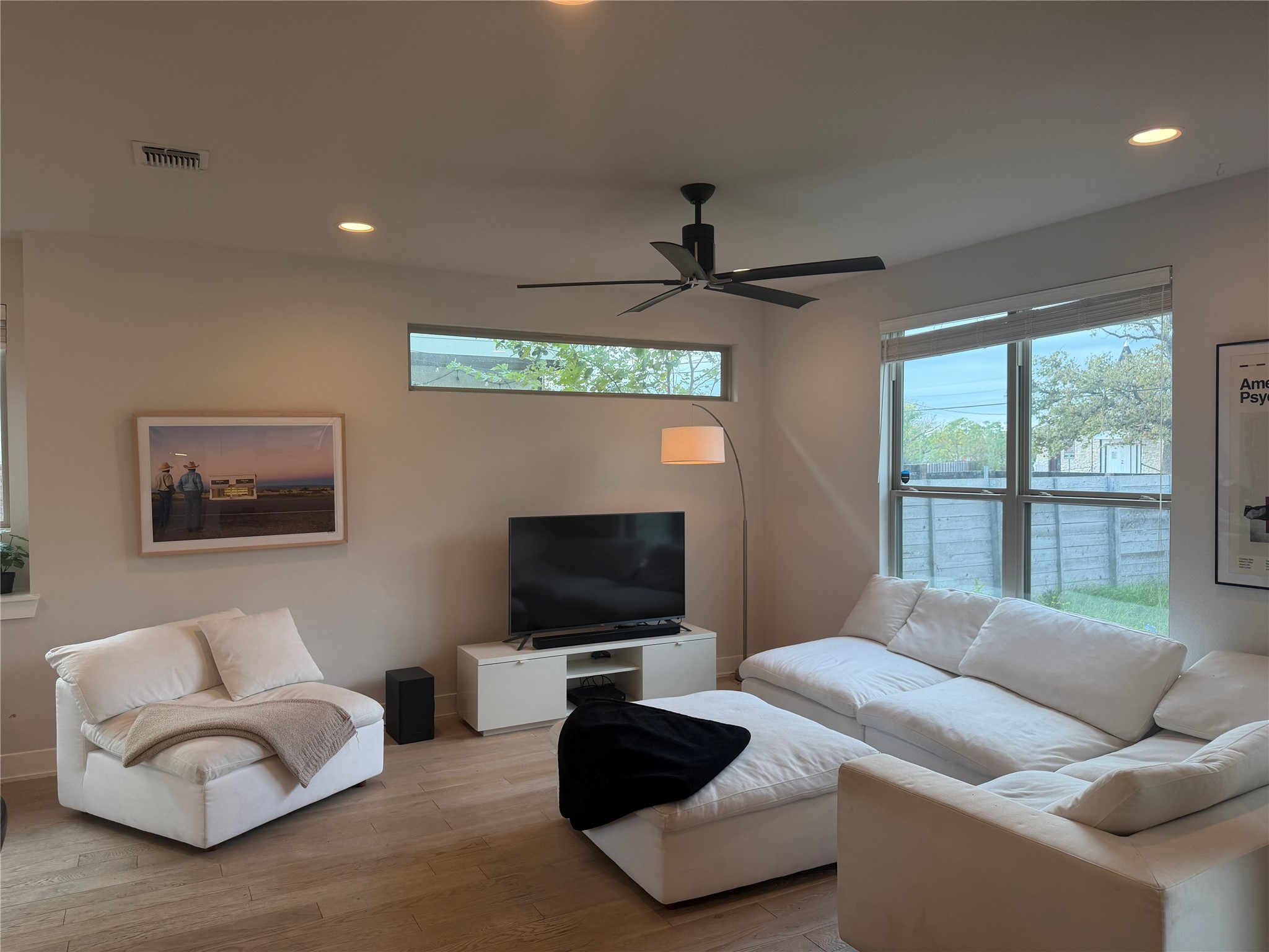 1159 Webberville Road, Unit A Austin, TX 78721 - Photo 2 of 26 Living room featuring recessed lighting, light wood finished floors, and a ceiling fan