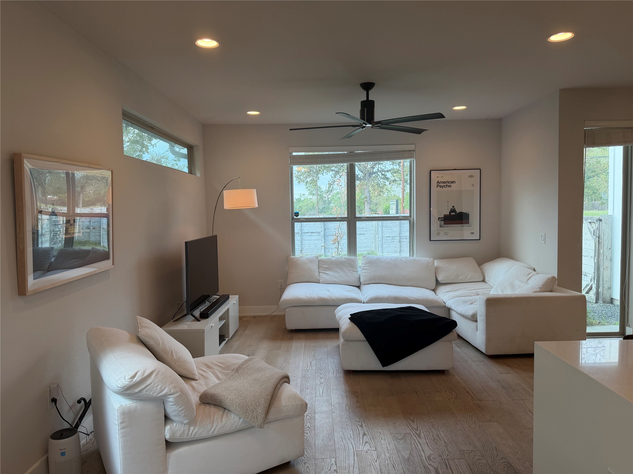 1159 Webberville Road, Unit A Austin, TX 78721 - Photo 4 of 26 Living area featuring recessed lighting, ceiling fan, and wood-type flooring