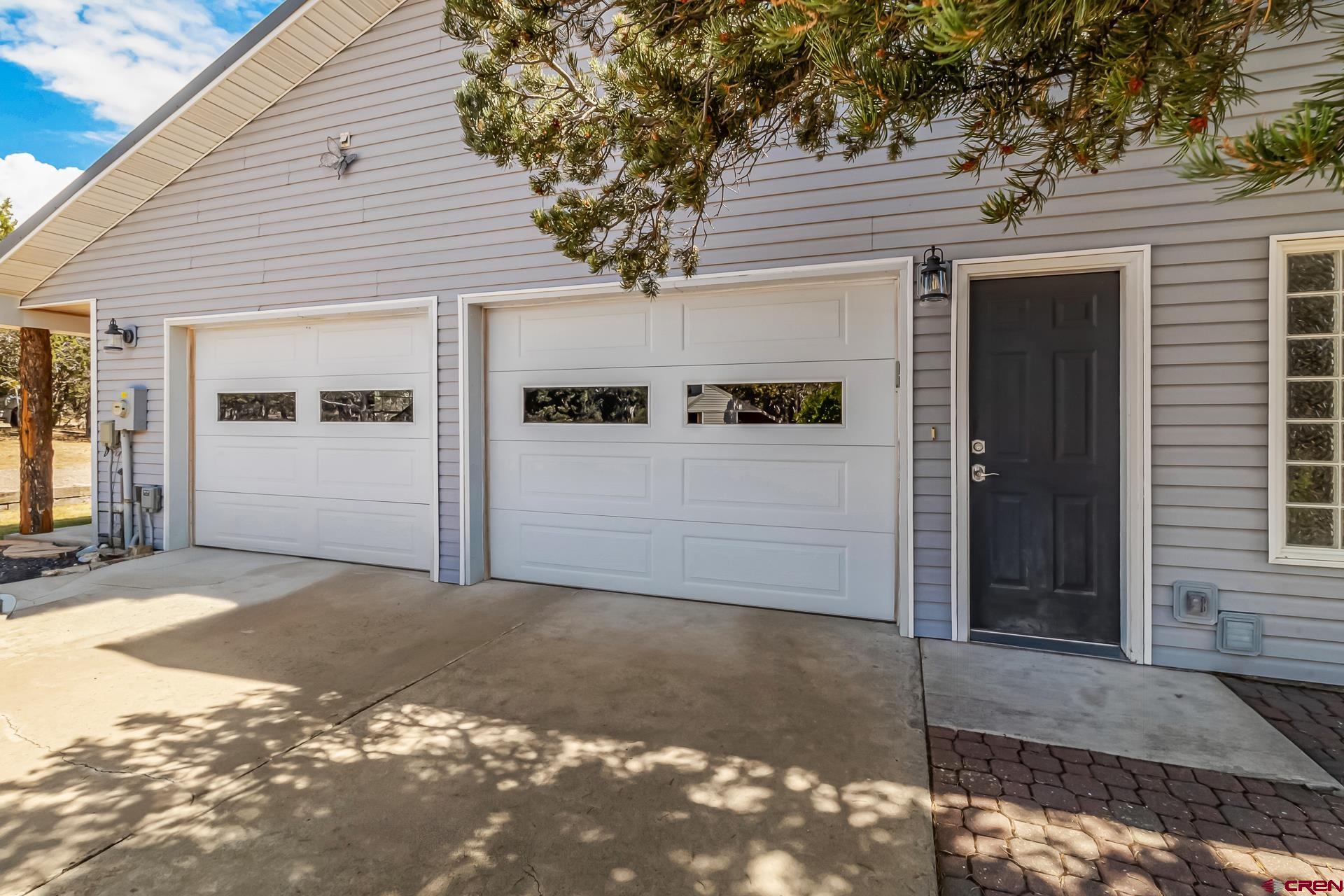 17656 2550th Road Cedaredge, CO 81413 - Photo 34 of 45 a view of a house with a tree