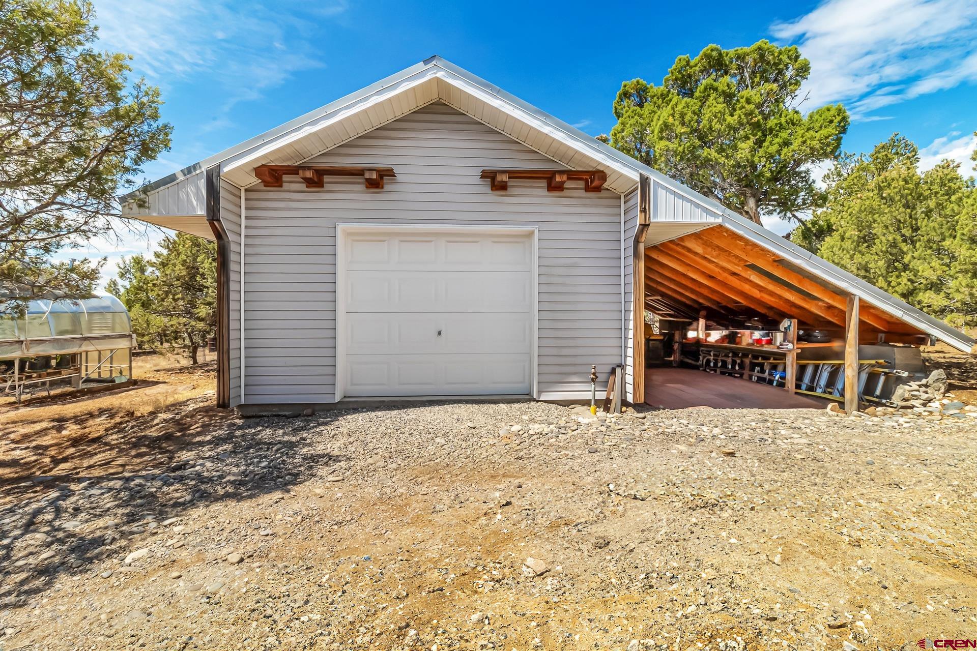17656 2550th Road Cedaredge, CO 81413 - Photo 39 of 45 a view of a house with a yard