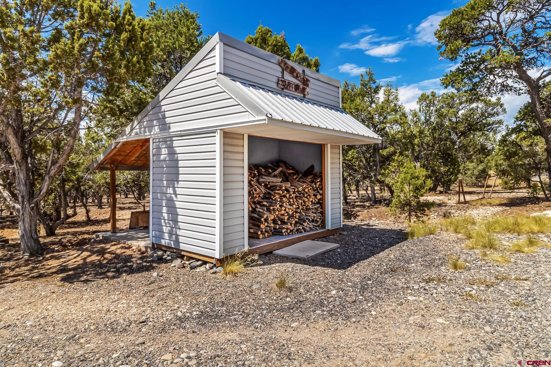 17656 2550th Road Cedaredge, CO 81413 - Photo 41 of 45 a view of a house with a yard