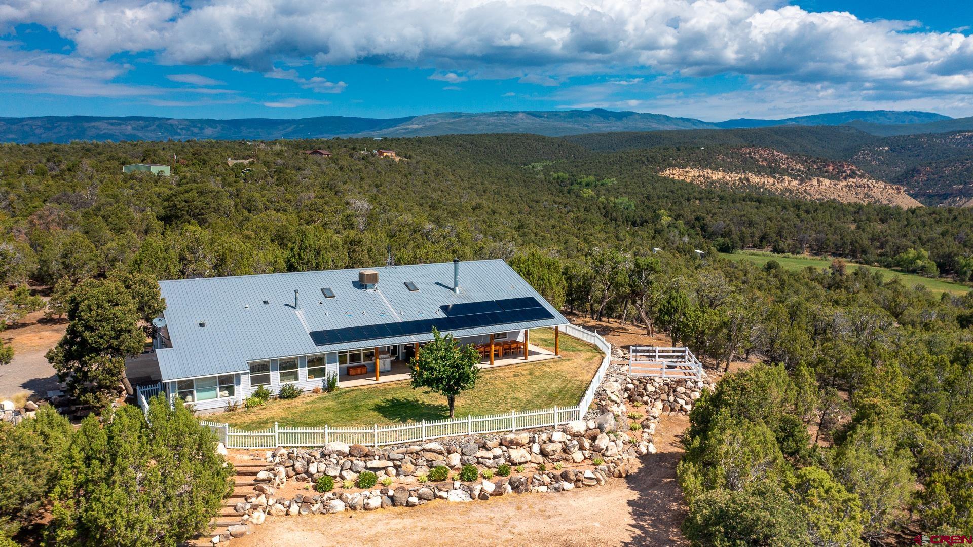 17656 2550th Road Cedaredge, CO 81413 - Photo 43 of 45 a view of a city with an ocean