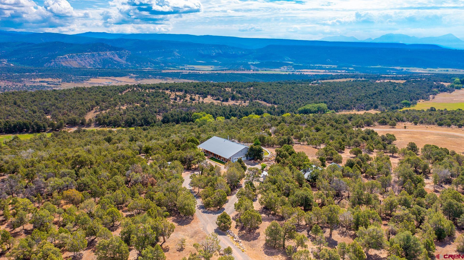 17656 2550th Road Cedaredge, CO 81413 - Photo 44 of 45 a view of lake and mountain