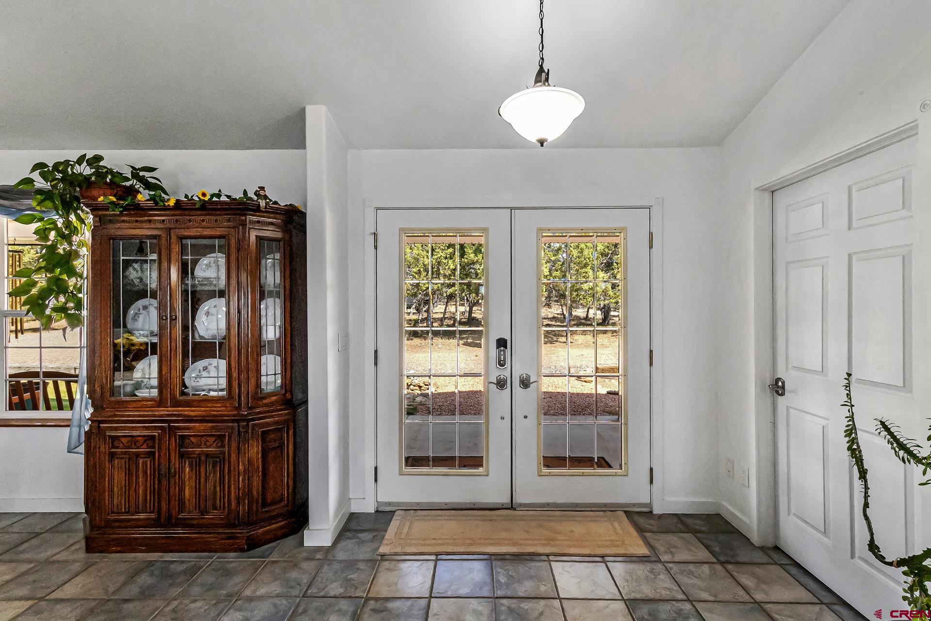 17656 2550th Road Cedaredge, CO 81413 - Photo 6 of 45 a view of an entryway with wooden floor