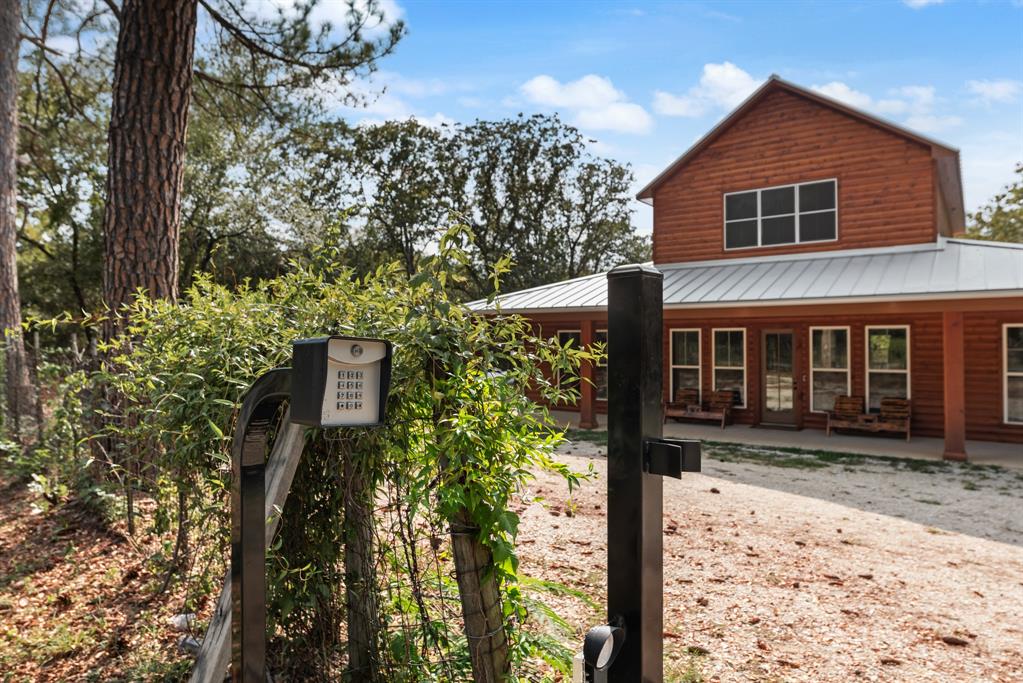 483 Spout Springs Road Pottsboro, TX 75076 - Photo 2 of 35 front view of a house with a yard