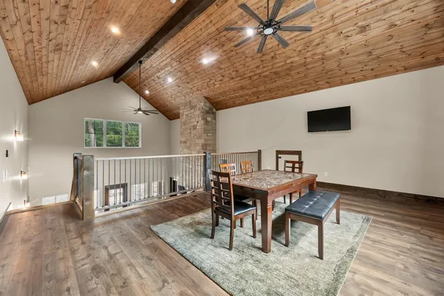 a workspace with furniture window and wooden floor