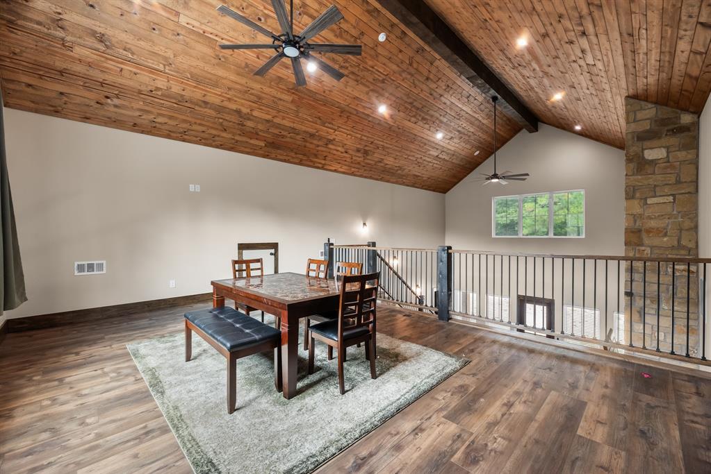483 Spout Springs Road Pottsboro, TX 75076 - Photo 26 of 35 a workspace with furniture wooden floor and window