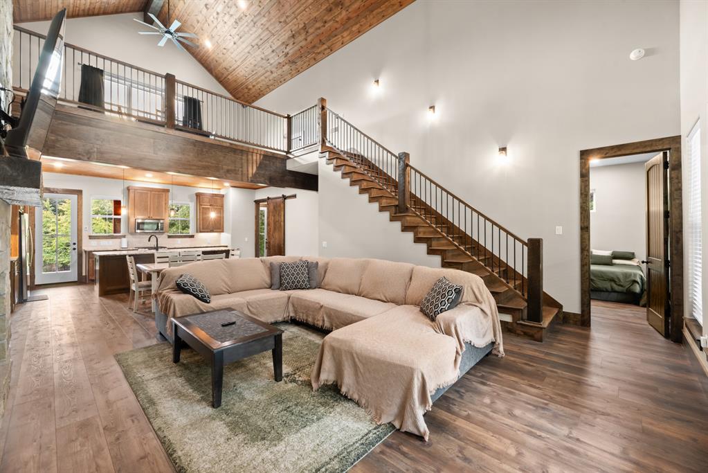 483 Spout Springs Road Pottsboro, TX 75076 - Photo 6 of 35 a living room with furniture and wooden floor