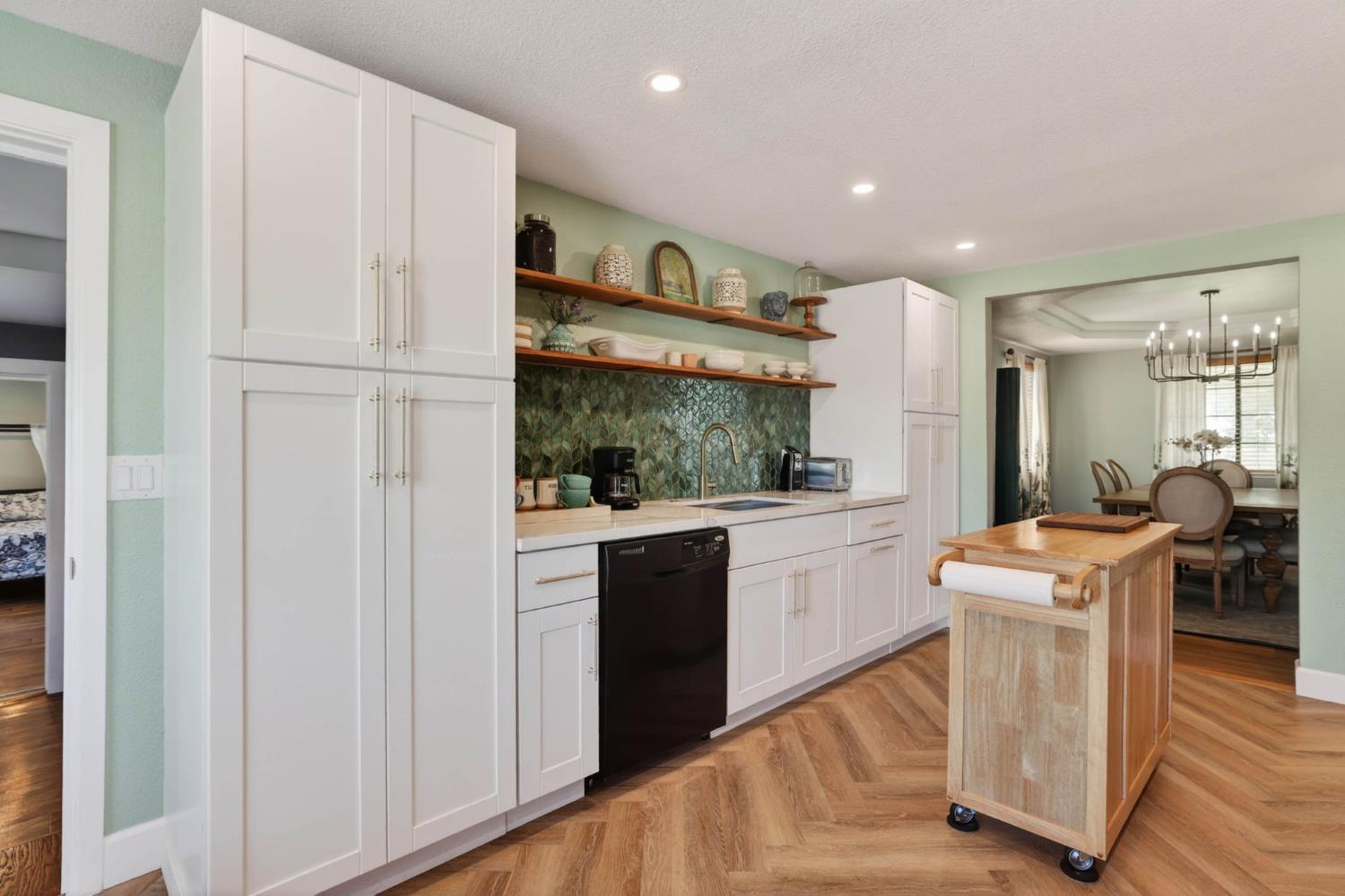 11875 Arno Road Wilton, CA 95693 - Photo 17 of 65 a kitchen with counter top space and stainless steel appliances