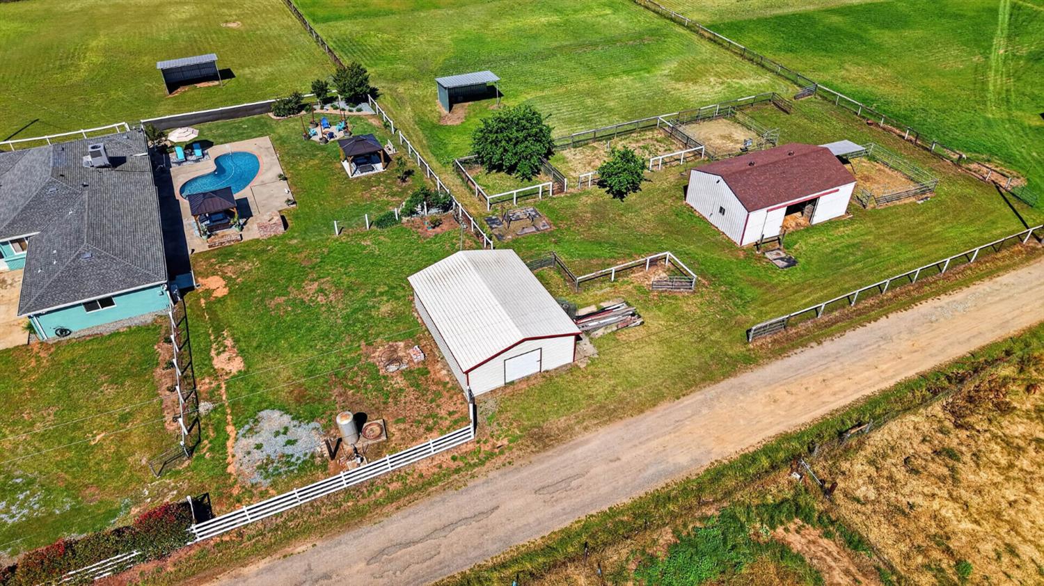 11875 Arno Road Wilton, CA 95693 - Photo 65 of 65 an aerial view of residential houses with outdoor space