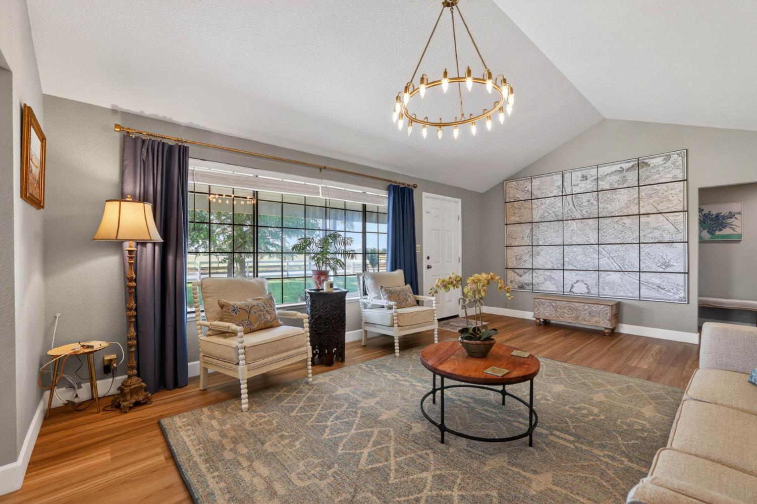 11875 Arno Road Wilton, CA 95693 - Photo 8 of 65 a living room with furniture and a large window