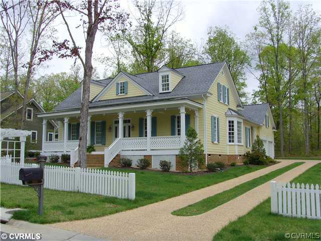 15931 Alsdell Road Midlothian, VA 23112 - Photo 1 of 12 a front view of a house with a garden and trees