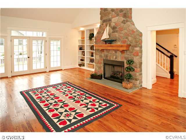 15931 Alsdell Road Midlothian, VA 23112 - Photo 4 of 12 a living room with a fireplace windows and a fireplace