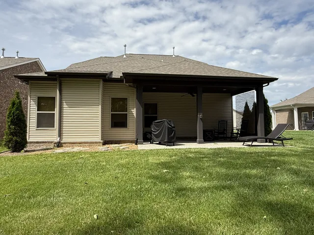 a house view with a garden space