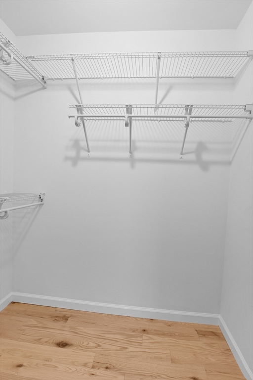 76 Number 6 Schoolhouse Road Charlton, MA 01507 - Photo 11 of 29 a view of a room with racks on the wall