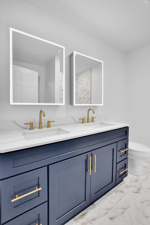 76 Number 6 Schoolhouse Road Charlton, MA 01507 - Photo 12 of 29 a bathroom with a sink and a mirror