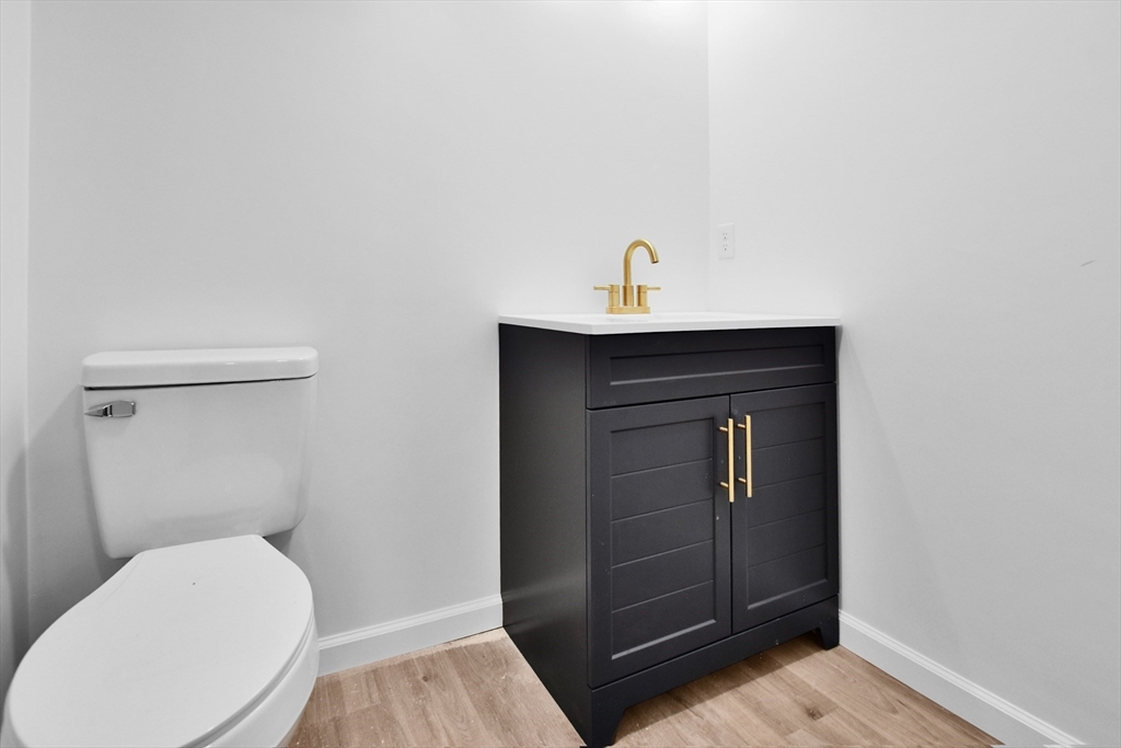 76 Number 6 Schoolhouse Road Charlton, MA 01507 - Photo 20 of 29 a bathroom with a toilet and a sink