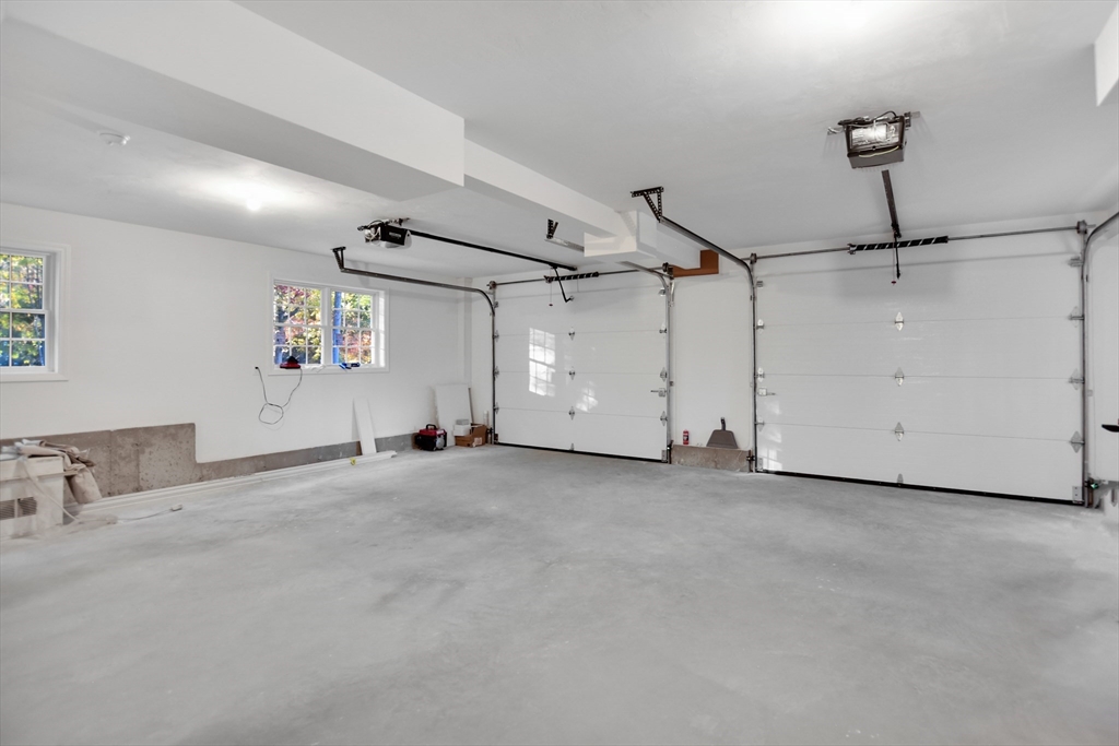 76 Number 6 Schoolhouse Road Charlton, MA 01507 - Photo 23 of 29 a view of a garage