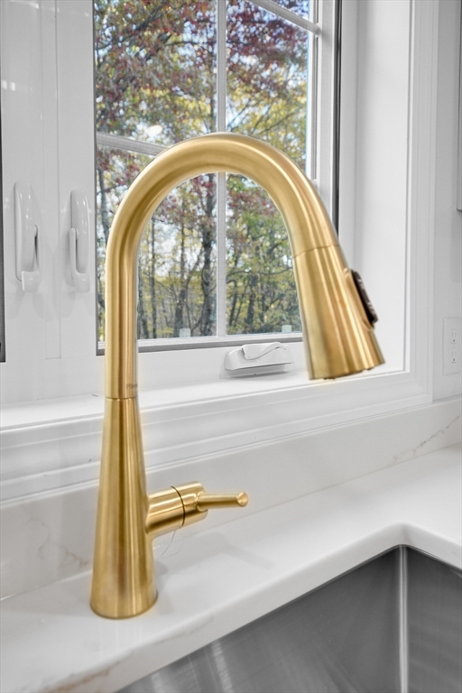 76 Number 6 Schoolhouse Road Charlton, MA 01507 - Photo 28 of 29 a view of a floor to ceiling window next to a yard