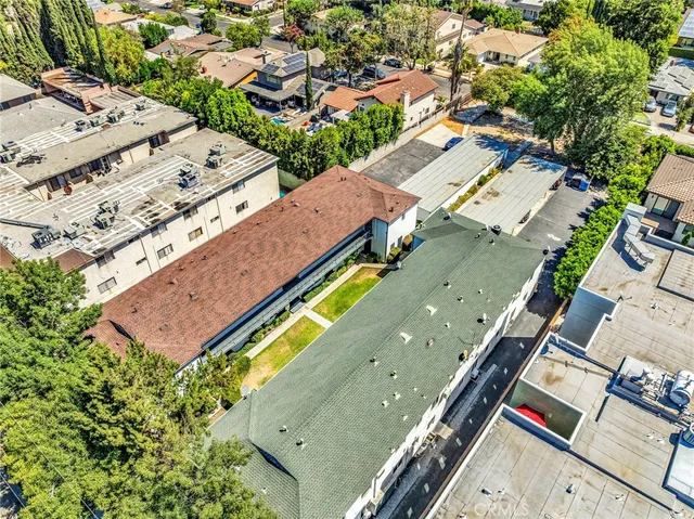an aerial view of residential house with outdoor space